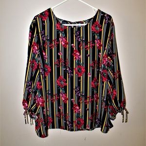 Black with yellow and white stripes, floral blouse